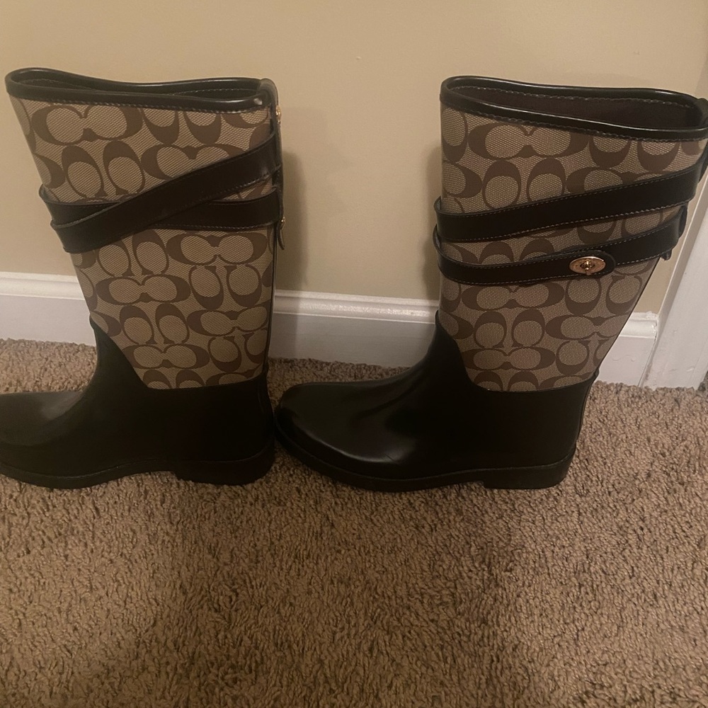 Coach rain boots . Slightly worn. Great condition still!